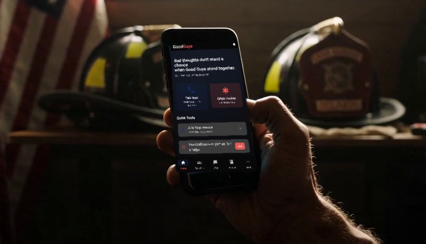 GoodGuys Hotline app in a firefighter's hand
